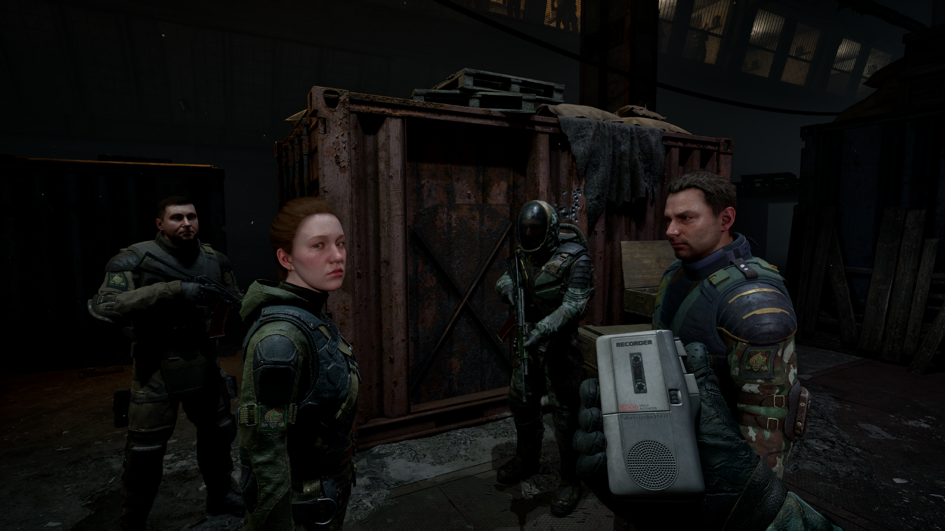 Skif plays an incriminating tape in front of Freedom members in STALKER 2: Cost of Hope.