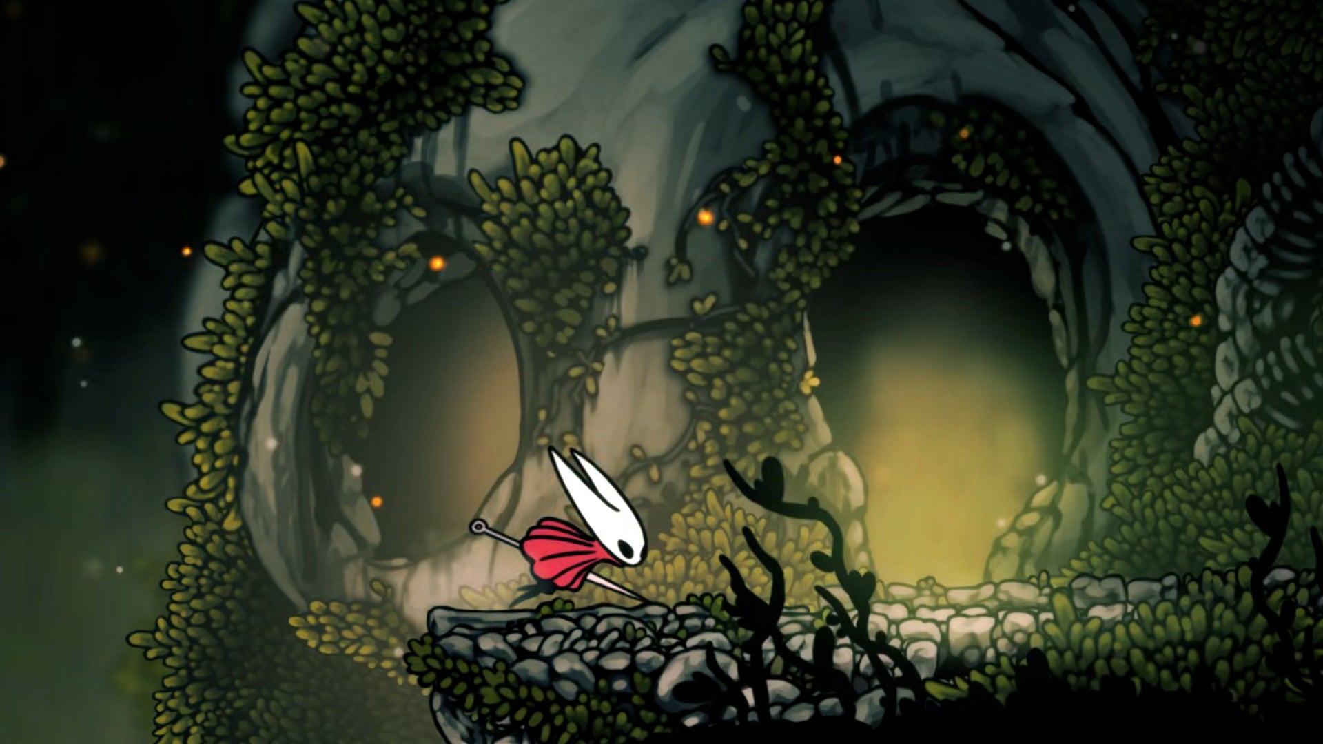 Hornet in Hollow Knight: Silksong sprints along a ledge in Far Fields with a giant skull-shaped cavern entrance in the background.
